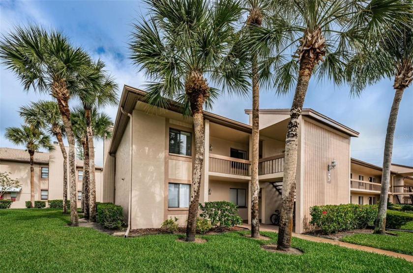 Located in East Lake Woodlands, a highly sought-after gated - Beach Condo for sale in Oldsmar, Florida on Beachhouse.com
