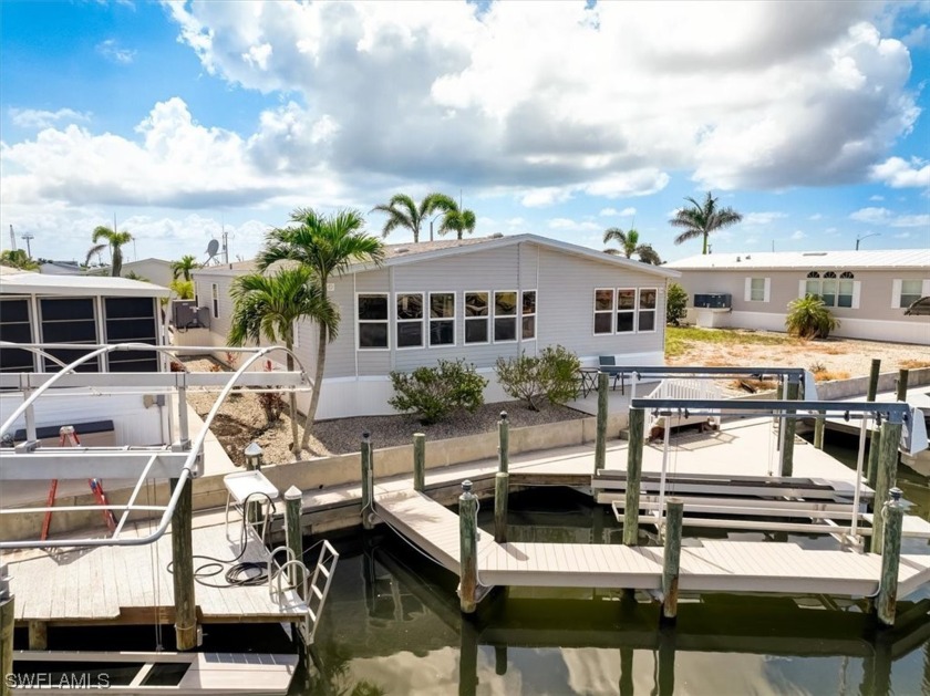 Welcome to the epitome of waterfront living in the charming - Beach Home for sale in ST. James City, Florida on Beachhouse.com