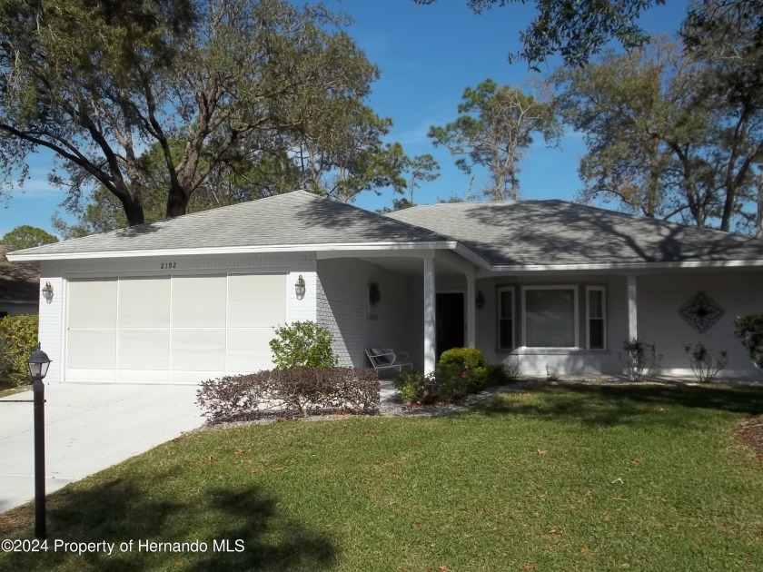 This updated home is located at the end of #1 of the Lakes golf - Beach Home for sale in Spring Hill, Florida on Beachhouse.com