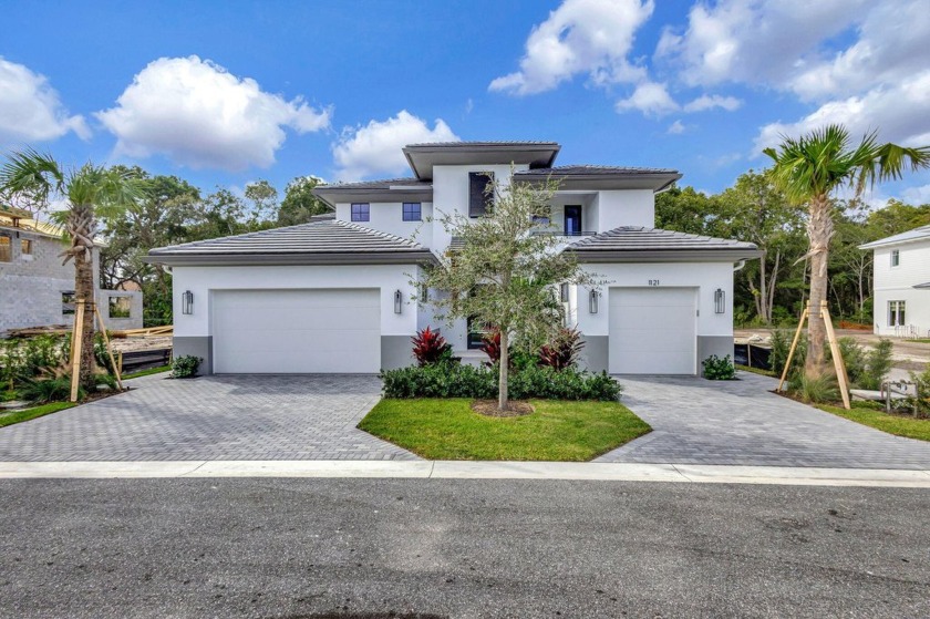 This architecturally stunning home boasts exceptional curb - Beach Home for sale in North Palm Beach, Florida on Beachhouse.com