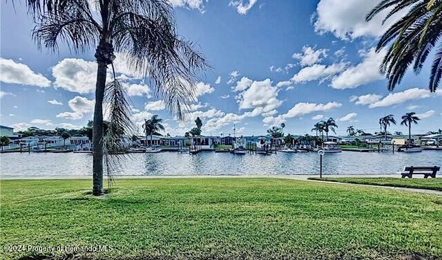 Experience the tranquility of waterfront living in this charming - Beach Condo for sale in New Port Richey, Florida on Beachhouse.com