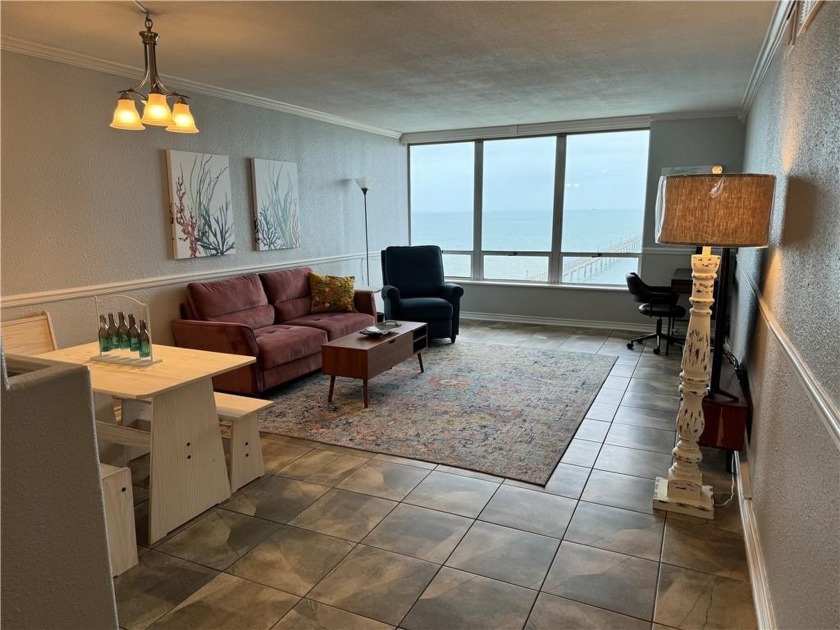 Large windows offer a beautiful unobstructed view of the bay - Beach Condo for sale in Corpus Christi, Texas on Beachhouse.com