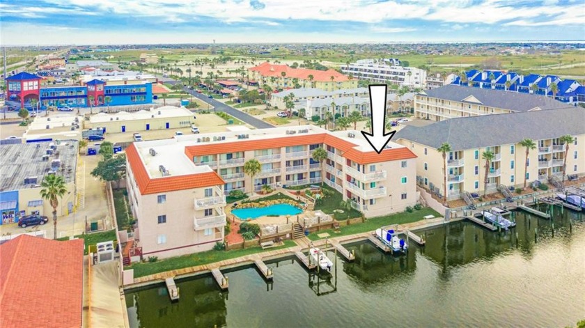 Perched above the canals, this third floor corner Mystic Harbor - Beach Condo for sale in Corpus Christi, Texas on Beachhouse.com