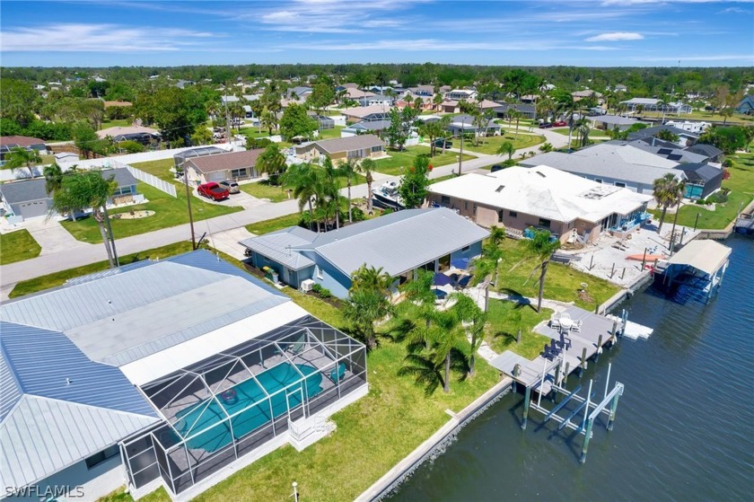 Welcome to your dream waterfront retreat! Wave runner dock with - Beach Home for sale in Port Charlotte, Florida on Beachhouse.com