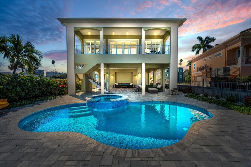 Lounge on your own sandy Beach on Boca Ciega Bay in Madeira - Beach Home for sale in Madeira Beach, Florida on Beachhouse.com