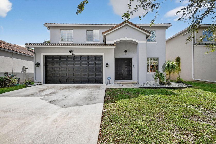 Beautifully maintained 4-bedroom, 2.5-bath single-family home in - Beach Home for sale in Royal Palm Beach, Florida on Beachhouse.com