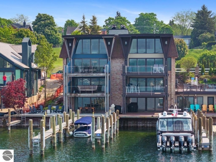 Walking distance to Downtown Charlevoix, this four-story - Beach Home for sale in Charlevoix, Michigan on Beachhouse.com