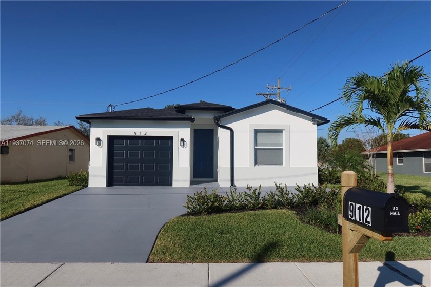 Stunning Modern Home in Riviera Beach! Discover this beautiful - Beach Home for sale in Riviera Beach, Florida on Beachhouse.com
