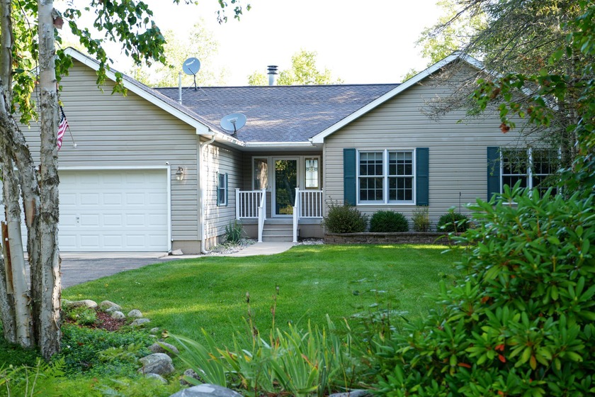 This one-owner ranch home on Lake Huron offers a perfect blend - Beach Home for sale in Presque Isle, Michigan on Beachhouse.com