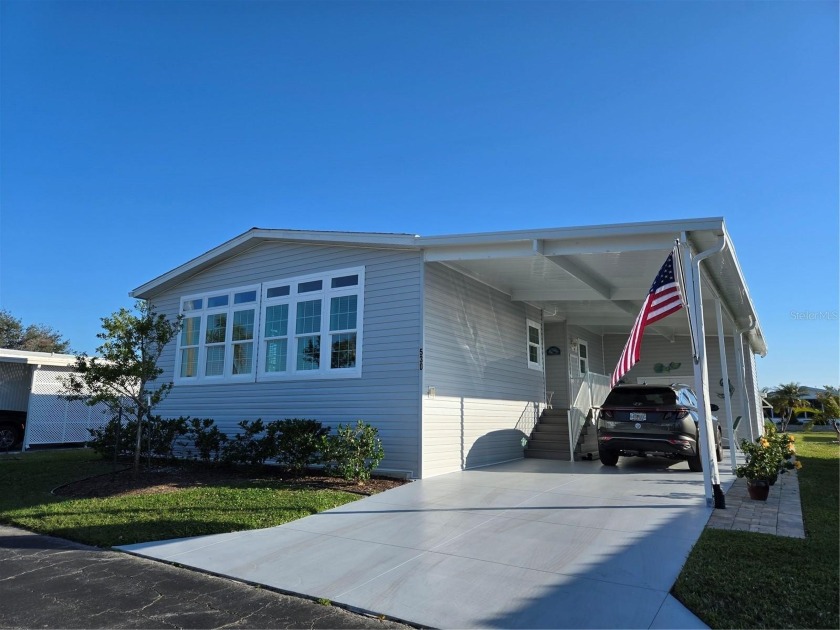 Welcome to this beautiful 2021 Jacobsen built, 2 bedroom PLUS - Beach Home for sale in Venice, Florida on Beachhouse.com