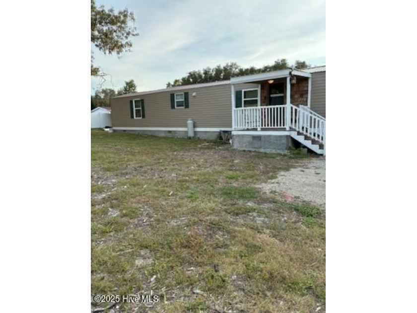 Welcome to this charming 3-bedroom, 2-bath home located in the - Beach Home for sale in Supply, North Carolina on Beachhouse.com