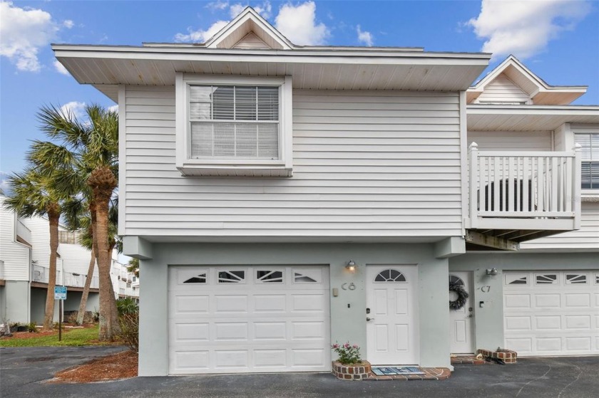 Stunning Waterfront Townhome with Deeded Boat Slip. Experience - Beach Townhome/Townhouse for sale in Indian Shores, Florida on Beachhouse.com