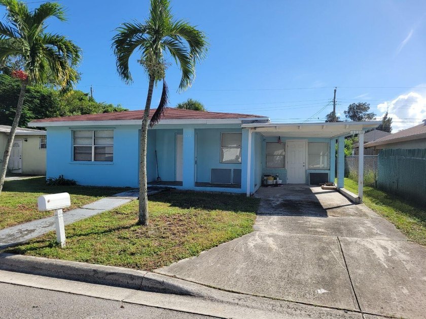 VACANT, NEWLY REMODELED PROPERTY,FLAT ROOF REPLACED,FLOORING - Beach Home for sale in Riviera Beach, Florida on Beachhouse.com