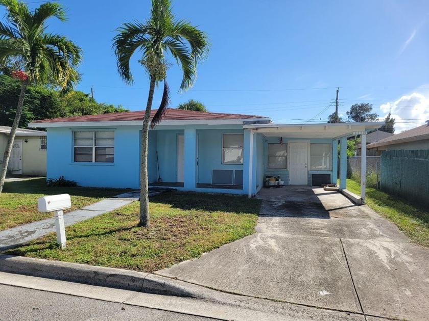 VACANT, NEWLY REMODELED PROPERTY,FLAT ROOF REPLACED,FLOORING - Beach Home for sale in Riviera Beach, Florida on Beachhouse.com
