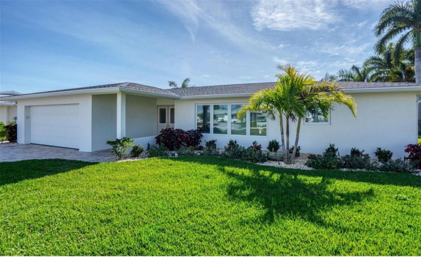 Discover your dream waterfront retreat! This stunning two - Beach Home for sale in Englewood, Florida on Beachhouse.com