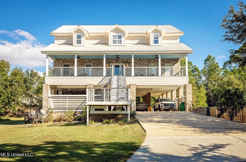 Spectacular Water Views & Boat Launch Ownership Access in Gulf - Beach Home for sale in Ocean Springs, Mississippi on Beachhouse.com