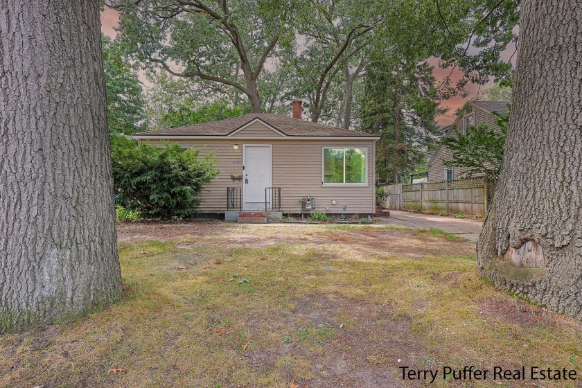 Welcome to 2165 Letart Avenue-this completely refreshed - Beach Home for sale in Muskegon, Michigan on Beachhouse.com