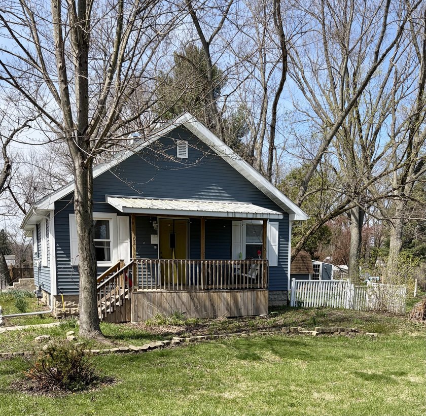 Charming Blue 1-Story Ranch Bungalow , this 3-bedroom 2-bath - Beach Home for sale in Michigan City, Indiana on Beachhouse.com