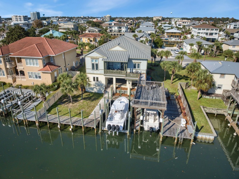 This home is located on Holiday Isle and offers the unique - Beach Home for sale in Destin, Florida on Beachhouse.com