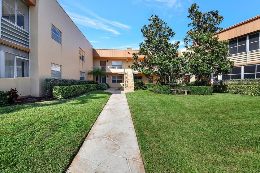 Experience golf course living with this beautifully renovated - Beach Condo for sale in Delray Beach, Florida on Beachhouse.com