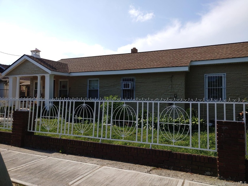 Single family home conveniently located in the corner of busy - Beach Home for sale in East Elmhurst, New York on Beachhouse.com