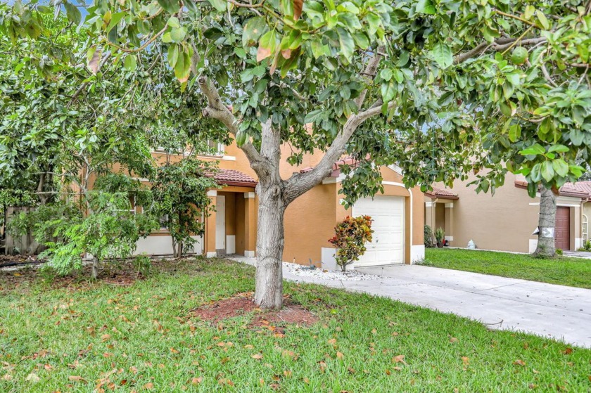 Nestled within a sought-after GATED COMMUNITY with a remarkably - Beach Home for sale in Deerfield Beach, Florida on Beachhouse.com