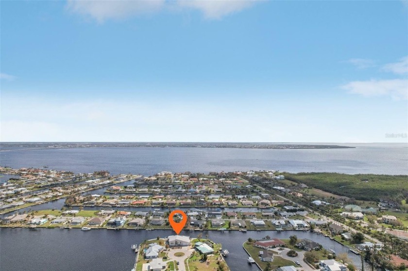 Waterfront Paradise with Sailboat Access - 260 Ft. of Seawall - Beach Home for sale in Port Charlotte, Florida on Beachhouse.com