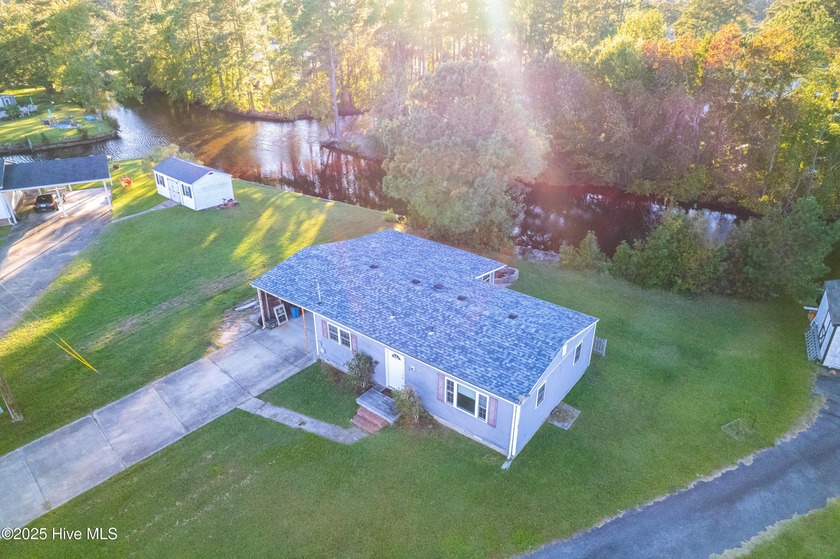 Enjoy waterfront living in the heart of Moyock! This charming - Beach Home for sale in Moyock, North Carolina on Beachhouse.com