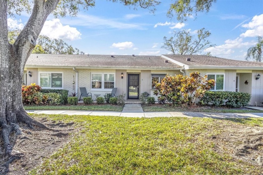 This charming Highland Lakes villa is a sanctuary of natural - Beach Home for sale in Palm Harbor, Florida on Beachhouse.com