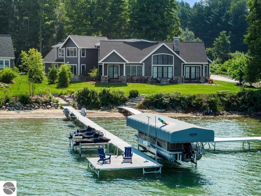 Built in 2022, this stunning 5-bedroom, 4.5-bathroom masterpiece - Beach Home for sale in Alden, Michigan on Beachhouse.com