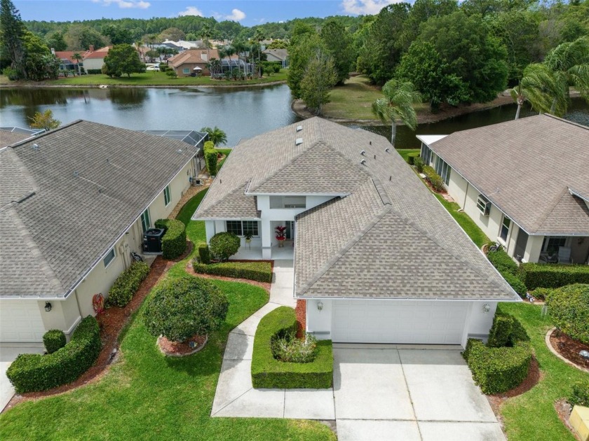 A Community Pool and Lawn Maintenance are just 2 Perks of living - Beach Home for sale in New Port Richey, Florida on Beachhouse.com