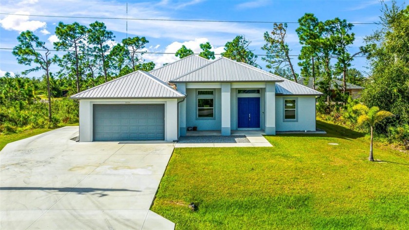 Discover elegance and tranquility in this Coastal-themed - Beach Home for sale in Port Charlotte, Florida on Beachhouse.com