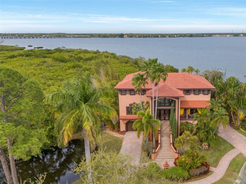 Welcome to this stunning WATERFRONT estate, set on nearly an - Beach Home for sale in Safety Harbor, Florida on Beachhouse.com