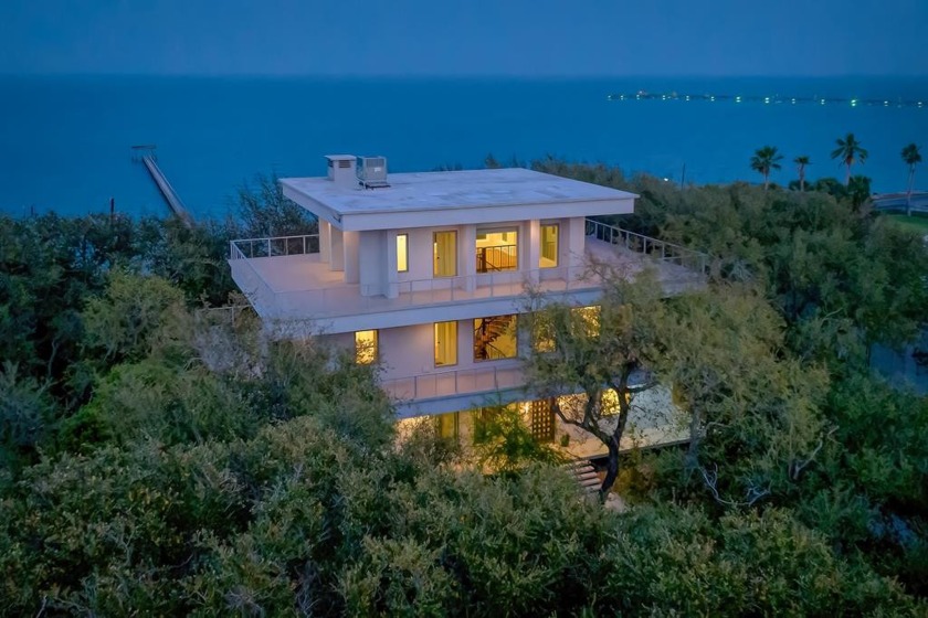 Stunning 3-story contemporary home embedded in sea of oak trees - Beach Home for sale in Fulton, Texas on Beachhouse.com