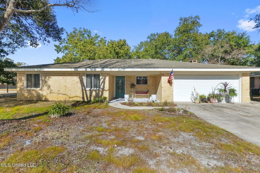 Welcome home to this well-maintained property nestled in an - Beach Home for sale in Ocean Springs, Mississippi on Beachhouse.com