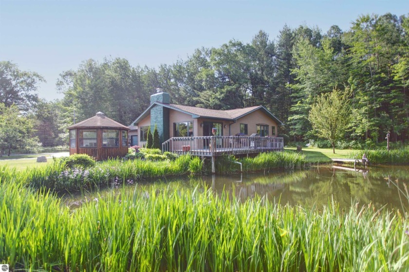 Hidden oasis that combines the quiet and beauty of nature - Beach Home for sale in Traverse City, Michigan on Beachhouse.com