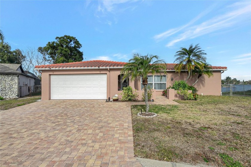 Welcome to your dream LAKEFRONT retreat! ASSUMABLE VA loan at - Beach Home for sale in Port Richey, Florida on Beachhouse.com