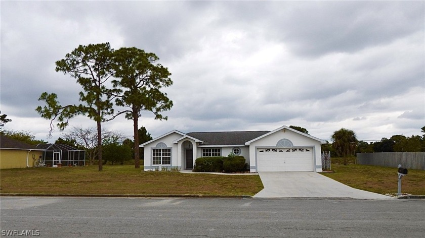 This wonderful home is situated on a oversized lot that backs to - Beach Home for sale in Lehigh Acres, Florida on Beachhouse.com
