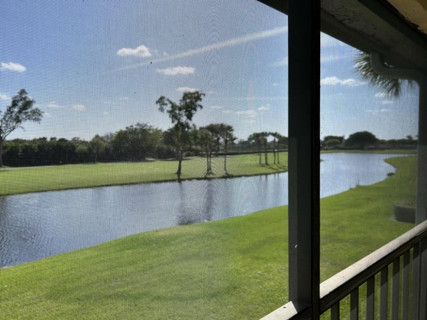 Lake front and golf views from this desirable Cypresses of Boca - Beach Condo for sale in Boca Raton, Florida on Beachhouse.com