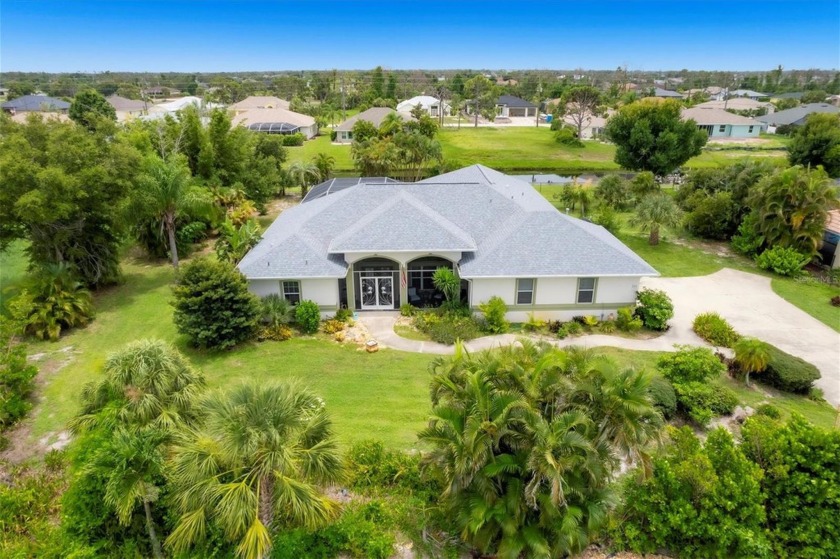 PRIVACY ABOUNDS with this immaculate custom Schroeder-built home - Beach Home for sale in Rotonda West, Florida on Beachhouse.com
