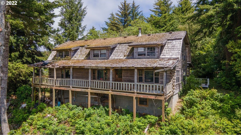 Never before on the market, this classic log cabin was built for - Beach Home for sale in Bandon, Oregon on Beachhouse.com
