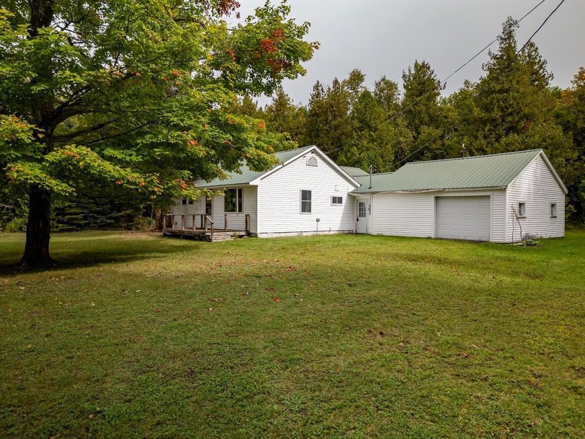 Location, Location, Location! This perfect home offers beautiful - Beach Home for sale in Saint Ignace, Michigan on Beachhouse.com