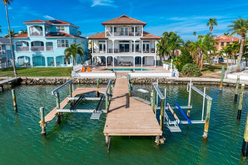 WOW!!!!! The only word to sum up this stunning waterfront, pool - Beach Home for sale in Madeira Beach, Florida on Beachhouse.com