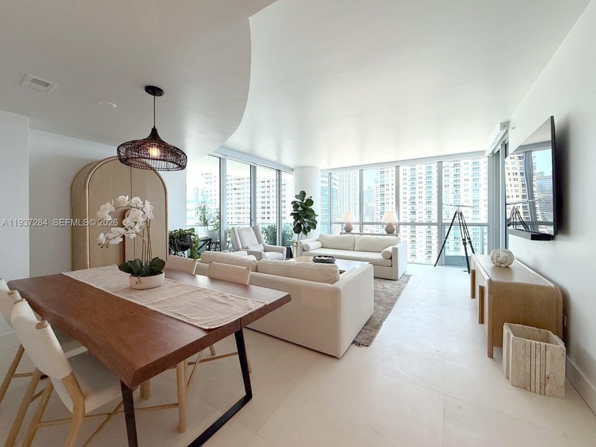 Picture yourself unwinding on your private balcony, watching - Beach Condo for sale in Miami, Florida on Beachhouse.com