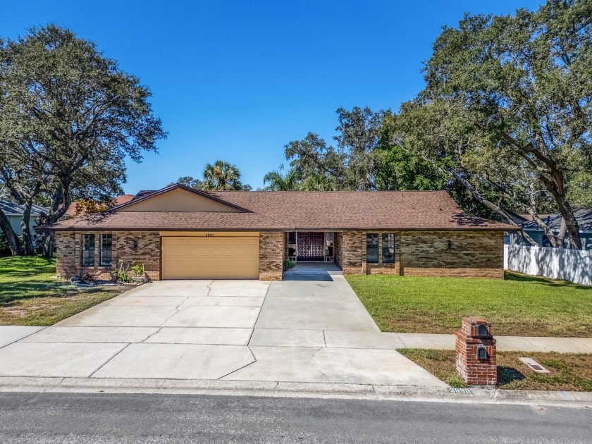 Beautiful 5-bedroom (or 4 plus study) pool home with a separate - Beach Home for sale in Palm Harbor, Florida on Beachhouse.com
