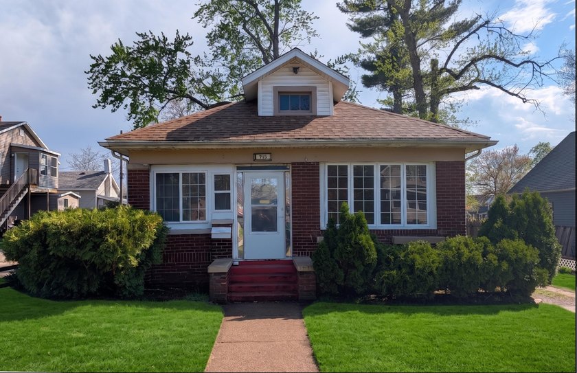 Step into this beautifully maintained Michigan City bungalow at - Beach Home for sale in Michigan City, Indiana on Beachhouse.com
