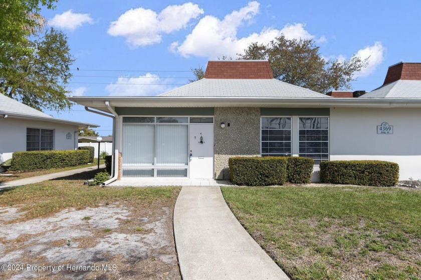 Welcome to your new home at 4369 Tahitian Gardens Circle #A in - Beach Home for sale in Holiday, Florida on Beachhouse.com