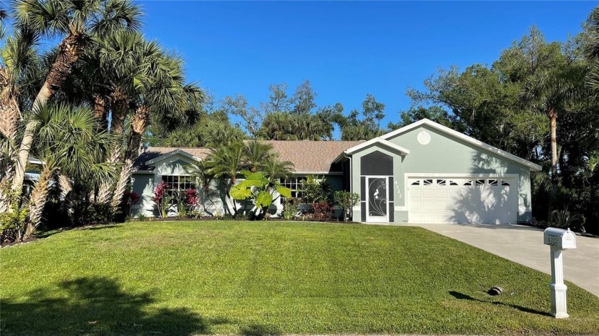 Indulge in the ultimate privacy, tropical charm, and the coveted - Beach Home for sale in Port Charlotte, Florida on Beachhouse.com