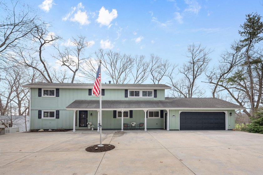 Perfectly situated along the 15th fairway of Long Beach Golf - Beach Home for sale in Long Beach, Indiana on Beachhouse.com