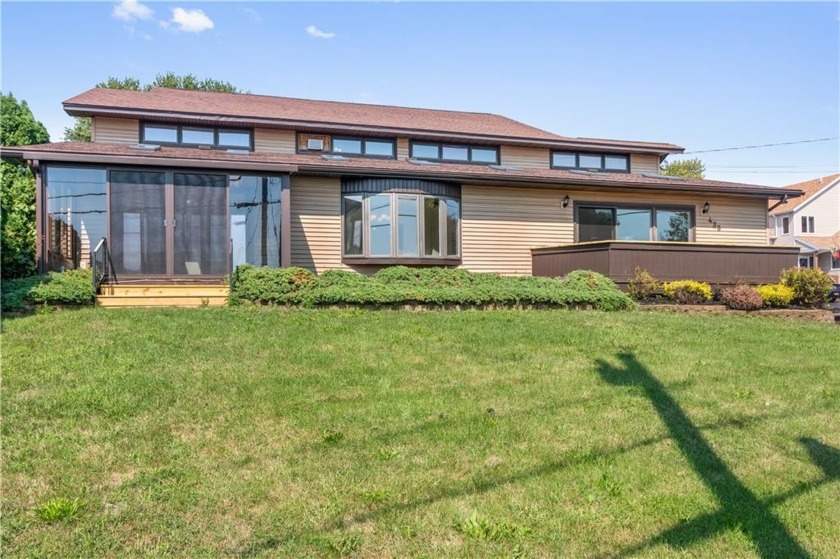 Welcome to this 3,809 SF spacious home with water access to Lake - Beach Home for sale in Rochester, New York on Beachhouse.com